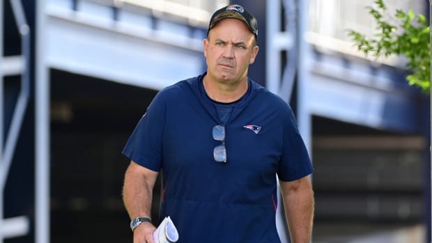 New England Patriots offensive coordinator Bill O’Brien walks to practice.